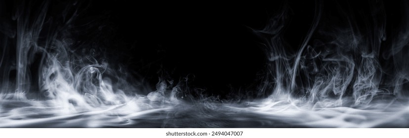 Real smoke exploding outwards with center space. Dramatic smoke or fog effect for spooky Halloween background or wallpaper.