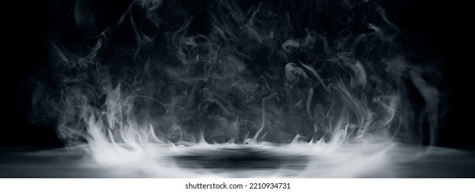 Real smoke exploding outwards with empty center. Dramatic smoke or fog effect for spooky Halloween background. - Shutterstock ID 2210934731