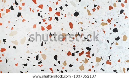 real terrazzo tile texture background. white stone with red ,brown ,black and yellow fragment background. abstract trendy vintage concept background.