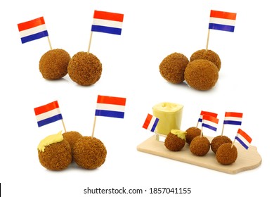 A real traditional Dutch snack called "bitterballen" with a Dutch flag toothpick on a white background