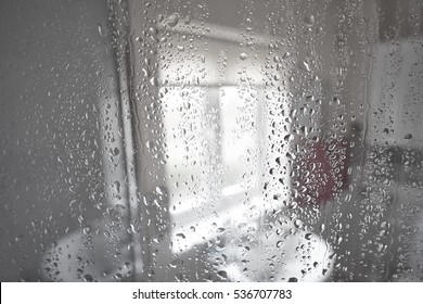 Real Water Drops And Steam On Shower Glass Box