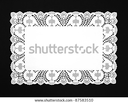 Real White Doily isolated on black background