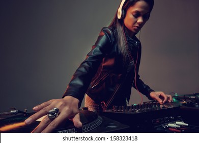 Real Woman Dj Playing Music At Party