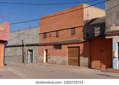 Realistic early morning street scene in Morocco with colorful houses. - Powered by Shutterstock