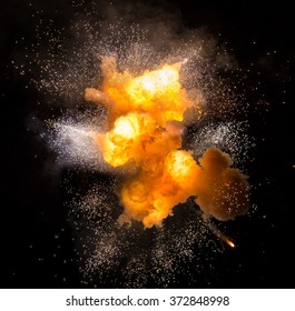 Realistic fiery explosion over a black background