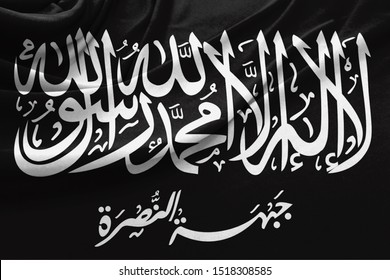 Realistic Flag Of Al Nusra Front On The Wavy Surface Of Fabric