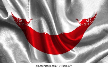 Realistic flag of Easter Island Rapa Nui on the wavy surface of fabric. This flag can be used in design.