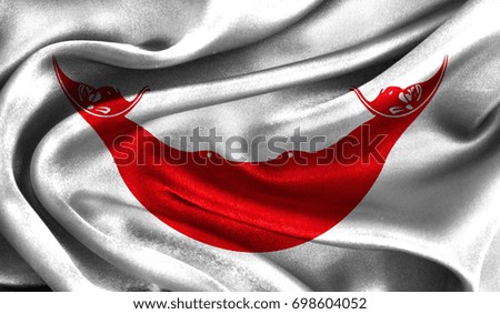Realistic flag of Easter Island Rapa Nui on the wavy surface of fabric. This flag can be used in design