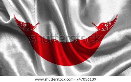 Realistic flag of Easter Island Rapa Nui on the wavy surface of fabric. This flag can be used in design.