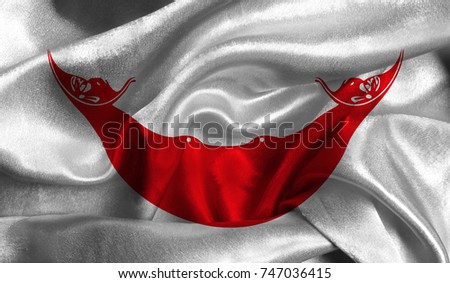 Realistic flag of Easter Island Rapa Nui on the wavy surface of fabric. This flag can be used in design.