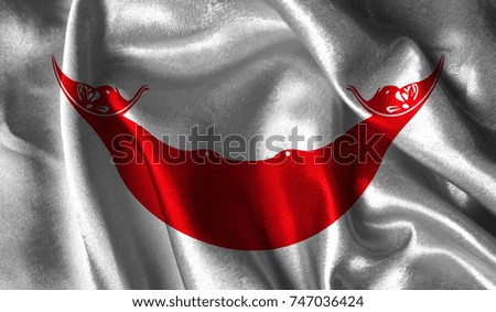 Realistic flag of Easter Island Rapa Nui on the wavy surface of fabric. This flag can be used in design.