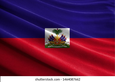 Realistic flag of Haiti on the wavy surface of fabric