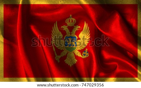 Realistic flag of Montenegro on the wavy surface of fabric. This flag can be used in design.