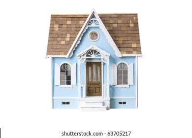 Realistic looking wooden dollhouse isolated on white with clipping path