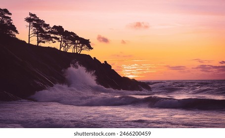 Realistic photographic of a purple sunset over a cliff with trees. Very rough waves are crashing through the rocks. - Powered by Shutterstock