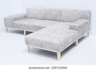 Realistic render of l-shape sofa, Dark structure and blue leather combination, Light structure with fabric combination for your home use.