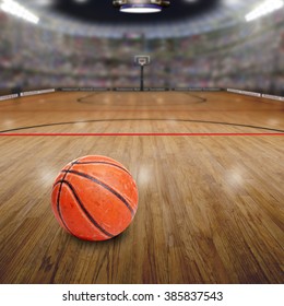 Realistic Rendering Of Basketball Arena Full Of Fans In The Stands With Ball On Court And Copy Space. Deliberate Focus On Seasoned Basketball And Shallow Depth Of Field On Background.