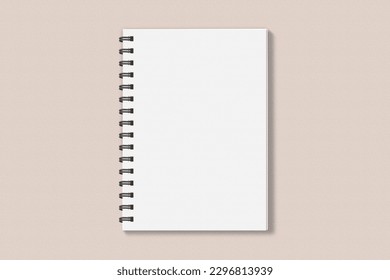 Realistic spiral notebook blank cover mockup flatlay. Simple blank note book mock up on clean background top view. White empty notepad cover to place your design, flat lay concept