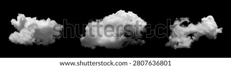 Realistic white clouds isolated on black background, fluffy cloud collection with soft texture for weather design, digital compositing, sky overlay, visual effects and graphic editing.