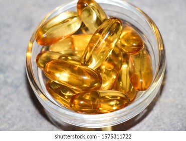 Download Omega Three Fish Oil Capsules On Yellow Images Stock Photos Vectors Shutterstock PSD Mockup Templates