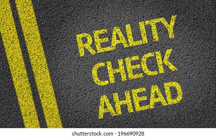 Reality Check Ahead Written On The Road