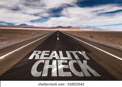 Reality Check Written On Desert Road