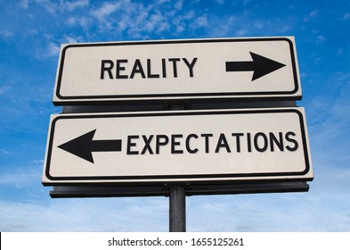 Reality vs expectation. White two street signs with arrow on metal pole with word. Directional road. Crossroads Road Sign, Two Arrow. Blue sky background. Two way road sign with text.
