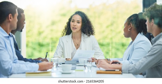 I Really Want Your Input. Shot Of A Team Of Staff Having A Business Meeting To Plan A Project In Their Office.