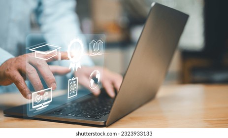 In the realm of studying and learning, students can pursue various courses and degrees online, utilizing technology and vast expanse of cyberspace to access quality education right from their laptops. - Shutterstock ID 2323933133