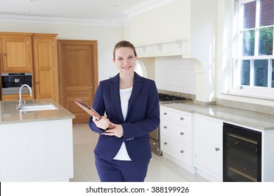 Realtor Looking Around Vacant New Property