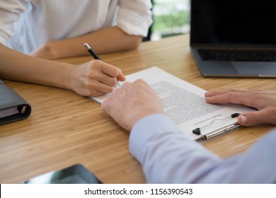 realtor talk with client.  real estate agent have a meeting with customer. sale & purchase property with signing contract document. mortgage loan agreement. - Shutterstock ID 1156390543