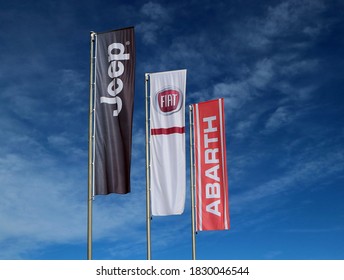 Reana, Italy. October 8 ,2020. Flags Of Jeep, Fiat And Abarth Outside The Local Car Dealer. They Are All Brands  Of The Italian Automotive Corporation FCA. 