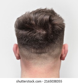 Rear Of An Attractive Young Males Head After A Fresh Skin Fade Haircut.