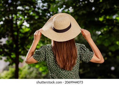 Rear Back View Photo Of Charming Woman Wear Green Dotted Dress Straw Headwear Nature Park Garden Outdoors