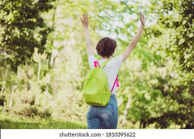 Rear Behind Profile View Photo Of Pretty Cute Lady School Backpack Shoulders Walk Empty Deserted Park Raise Arms Enjoy Loneliness No People City Crowd Wear T-shirt Green Road Outdoors