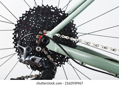Rear bicycle cassette speeds with a wide range and chain close-up