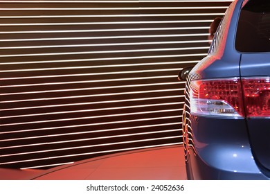 Rear Car Light against a neon multicolored backgroung