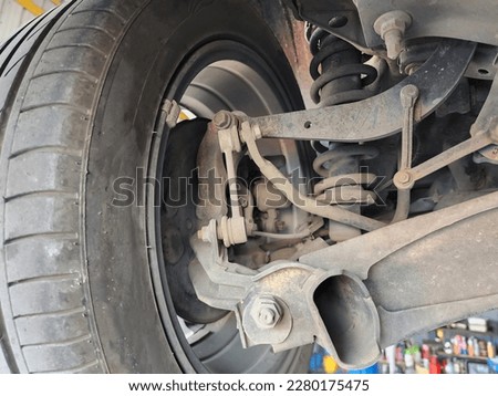 Rear car suspension a rear wheel the old Stock photo © 