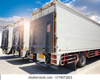 Rear Of Door Hydraulic Lift Truck On Parking At The Warehouse. Cargo Freight Truck Transport And Logistics.