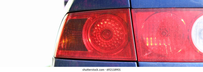 Rear left car lantern optics blue on red