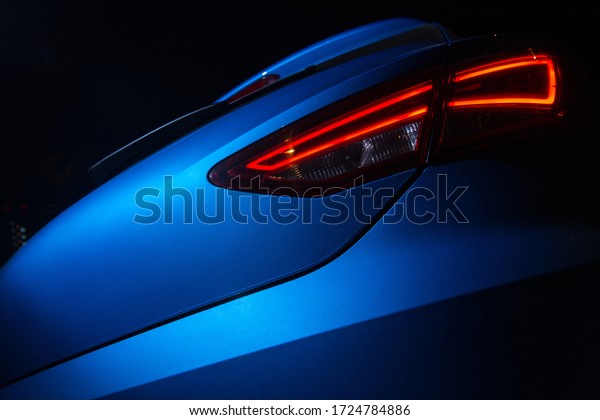 Rear light of\
modern dynamic car. Red LED\
light