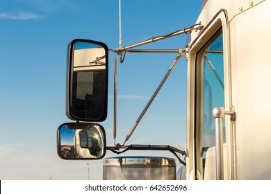 Rear Outside Truck Back Mirror On Sky Background