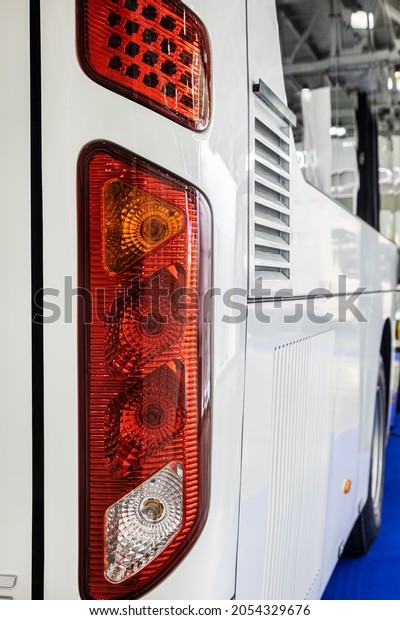 The rear Parking lights of the city bus. Modern\
led and halogen lighting