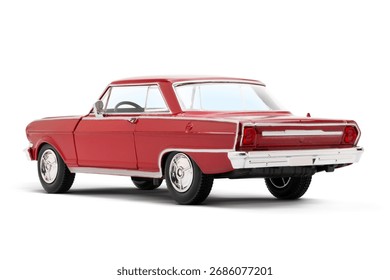 Rear and partial left side view of a Red colored muscle model toy car photographed on a white background.