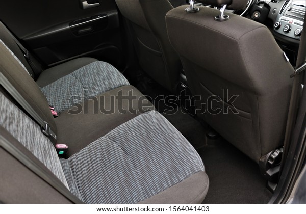 Rear seats of a car
interior.