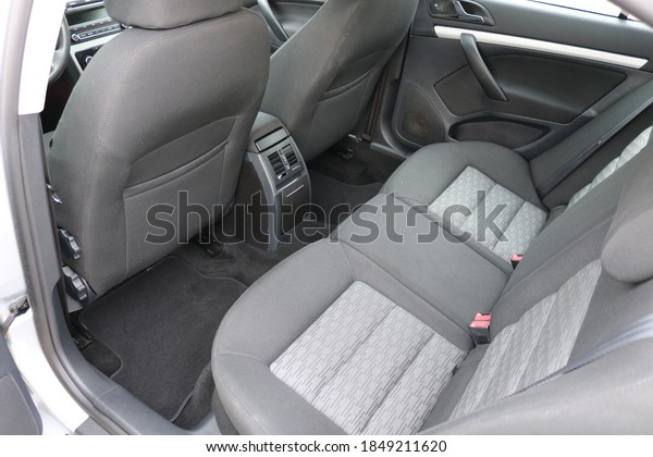 Rear seats of a car\
interior.