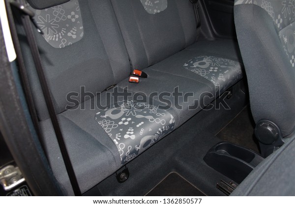 Rear seats of a\
car interior. Auto back\
seats.