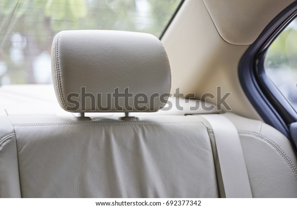 Rear seats head rest in the\
car.