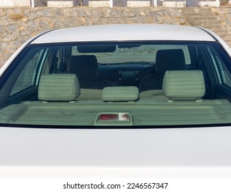 Rear seats headrest view inside the car back windshield - Shutterstock ID 2246567347