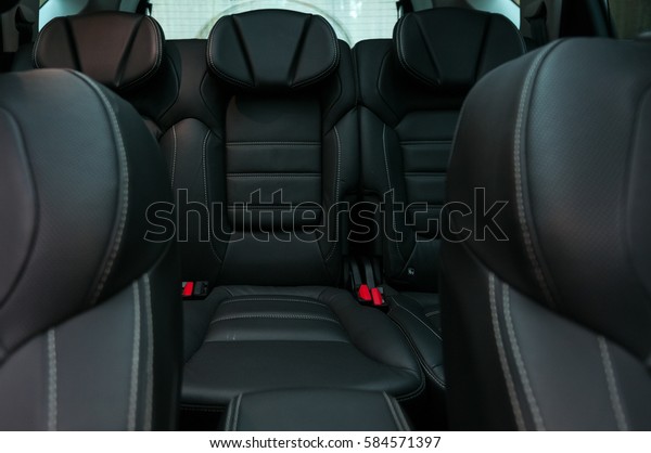 Rear seats. Three in the\
row.